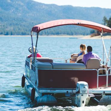 Family in a pontoon on Big Bear Lake