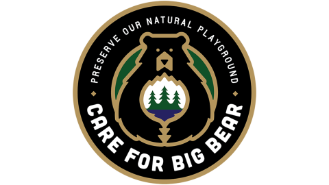 A digital logo for Care for Big Bear - the circular logo is colored in their brand colors with a bear in the center.