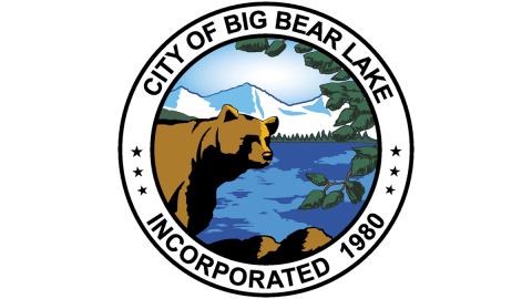 A digital logo for the City of Big Bear Lake - there is a brown bear in front of a lake with mountains in the distance.