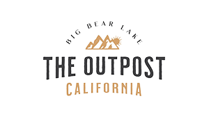 A digital logo for The Outpost California in Big Bear Lake - there are golden colored mountain outlines with a sun behind it.