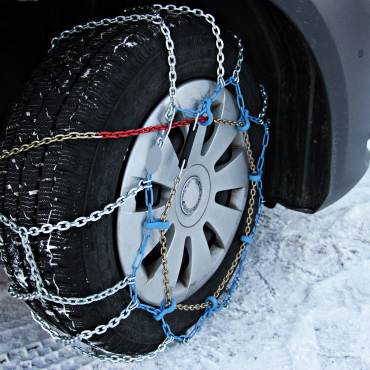Snow chains on tire in Big Bear Lake California