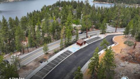 A drone shot of the Castle Rock Parking Lot, there is a large amount of parking spaces as well as handicap parking.