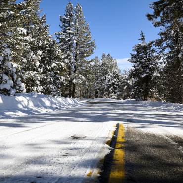 A Big Bear Lake road covered in snow and ice during winter in Big Bear, California