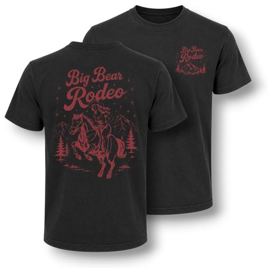 A black t-shirt sold during the Big Bear Lake Rodeo - the back has a red outline of a cowgirl riding on top of a horse.