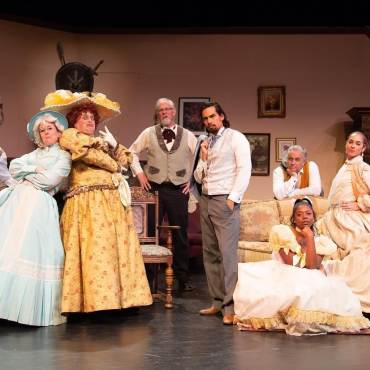 A cast of characters wear Victorian style costumes during their performance in Big Bear Lake.