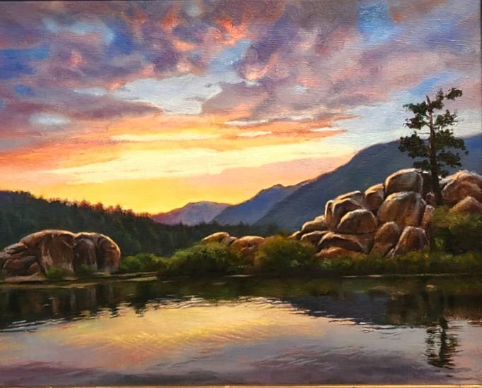 The 1st place winner of the 2024 Plein Air arts competition, her piece shows the sunset gently reflecting on the lake.