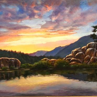 The 1st place winner of the 2024 Plein Air arts competition, her piece shows the sunset gently reflecting on the lake.