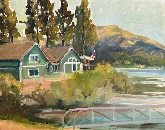 The 2nd place winner of the 2024 Plein Air arts competition, her piece shows a large green house overlooking the lakeside.