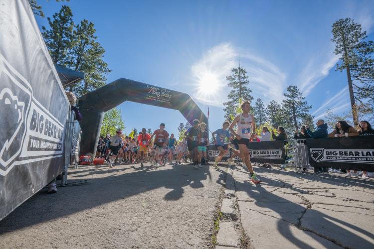 Memorial 5k ending with racers crossing the finish line