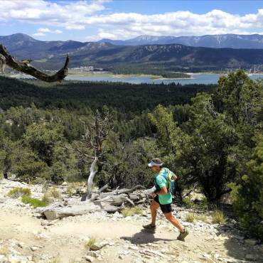 A runner runs along a trail during the Big Bear Lake Holcomb Valley Trail Run.