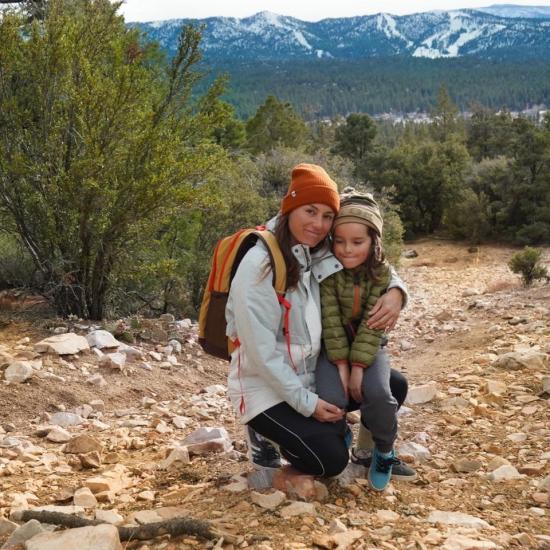 A mother and son pose for a photo during a hike in Big Bear Lake.
