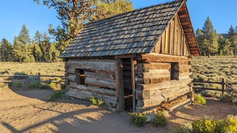 A historic log cabin from Holcomb Valley's gold rush days.